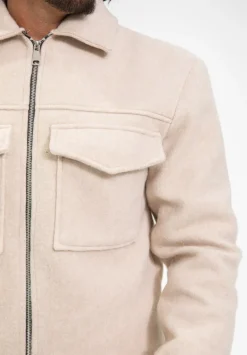 Veste uni col revers