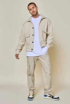 Veste uni texturé avec grandes poches à rabat